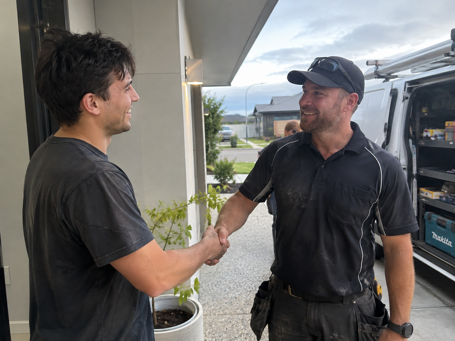A Done Right Plumber Perth plumber shaking hands with a happy customer